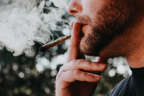 man smoking cannabis